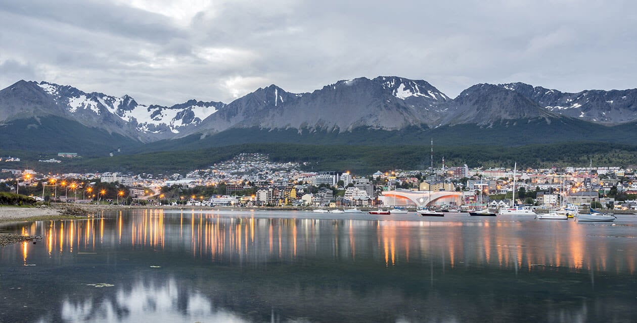 Ushuaia town from distance with backdrop of mountains