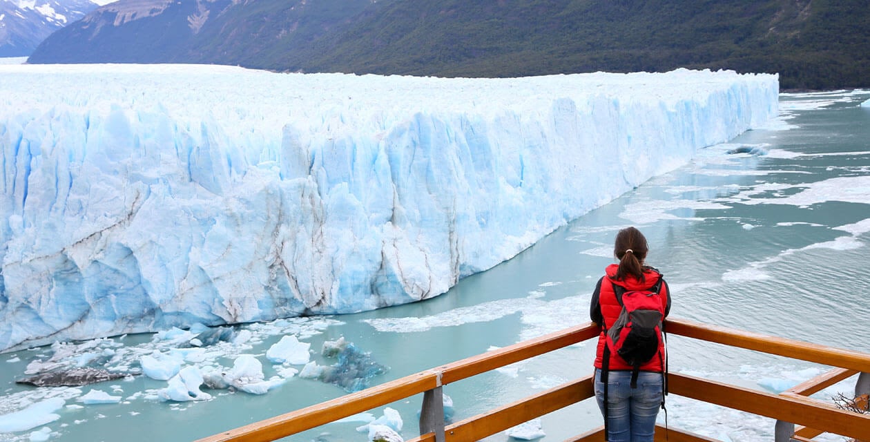woman standing at viewpoint for Perito Moreno Glacier