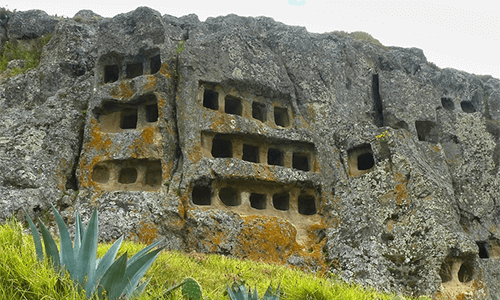 You can see the windows carved within the cliff as a pre-Inca necropolis