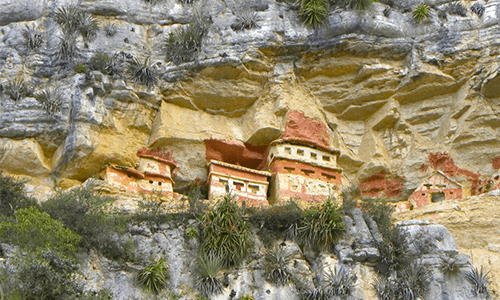Displaying infrastructure carved within the mountainside walls in Revash, Chachapoyas