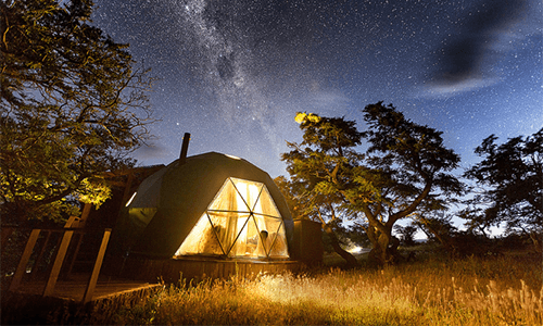 EcoCamp Patagonia Lodge sitting in Torres del Paine National Park with millions of stars above