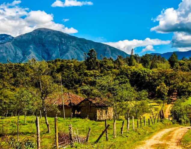 Dirt road winds through Boyaca countryside in Colombia
