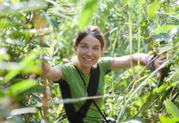 woman exploring the jungle on an amazon rainforest tour