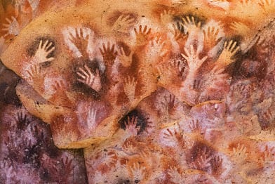 Ancient stenciled handprints at Cueva de las Manos in Santa Cruz Province, Patagonia