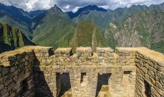 inside-machu-picchu-ruins-overlooking-mountains