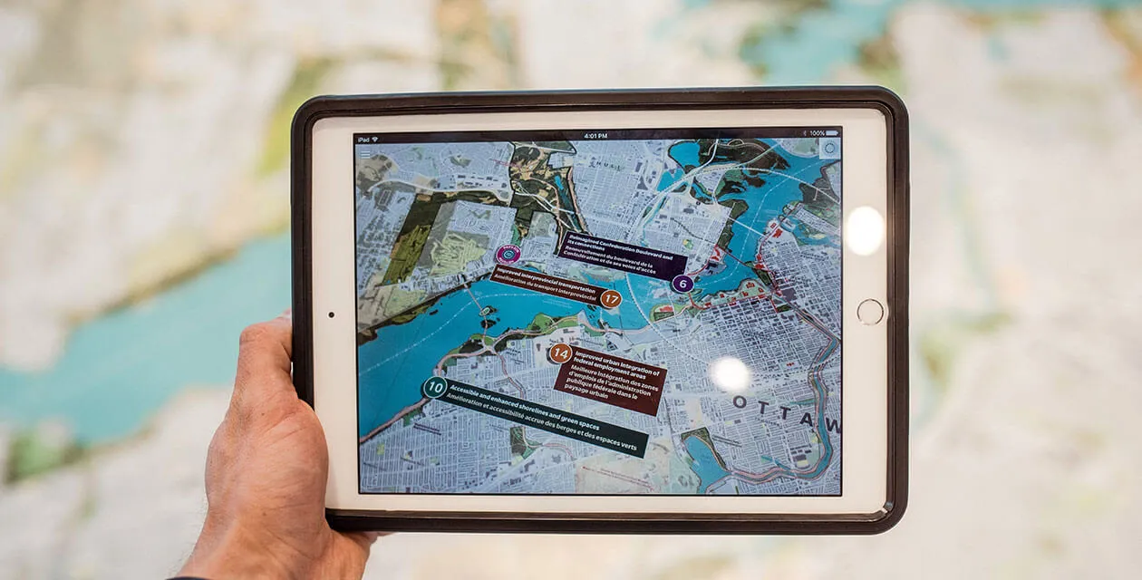 man holding tablet with map