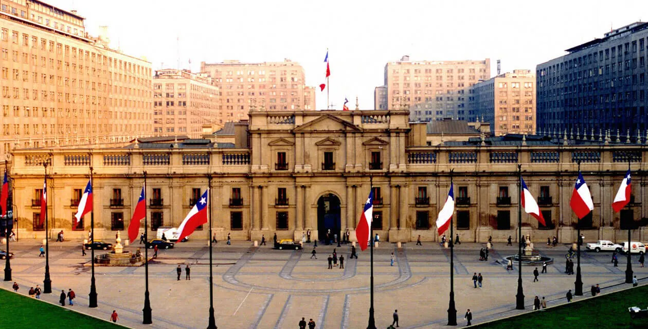 La Moneda Palace amidst city 