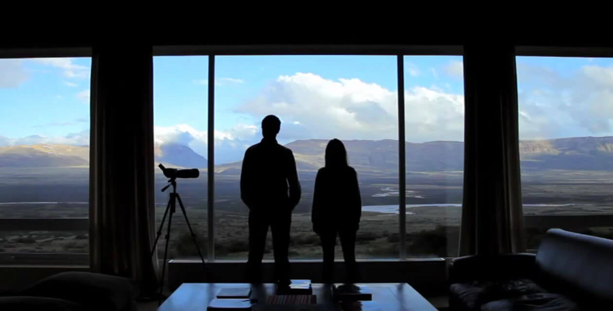 Two guests at Eolo starring at beautiful view of El Calafate