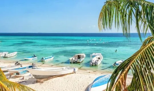 beautiful-beach-with-boats-resting-on-the-shore