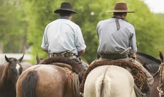 gauchos-of-argentina-riding-horseback