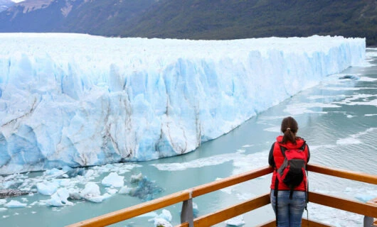 woman standing at viewpoint for Perito Moreno Glacier