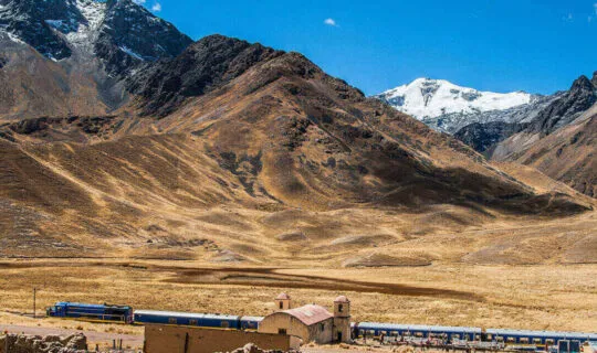 train station amidst the andes