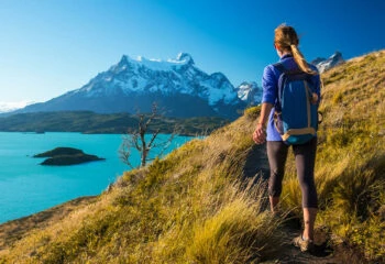 woman hiking in torres del paine national park