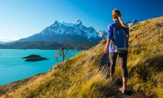woman hiking in torres del paine national park
