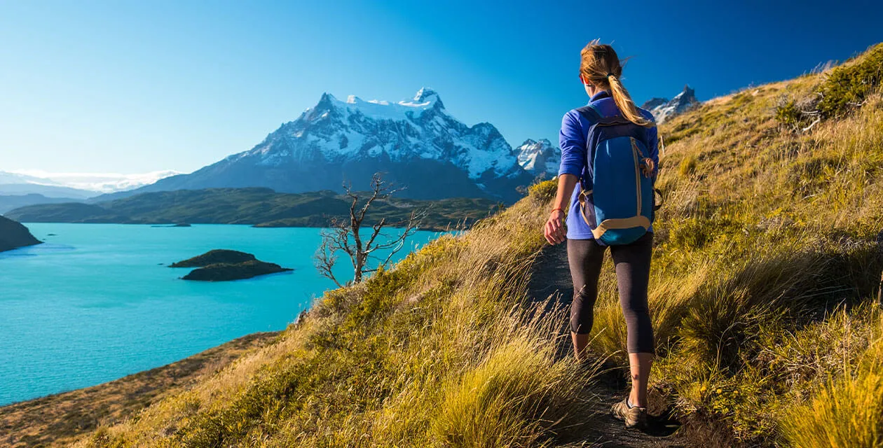 woman hiking in torres del paine national park