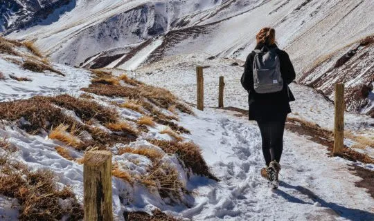 man-beginning-hike-on-mountain