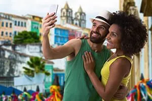 couple taking selfie - Travel Myths