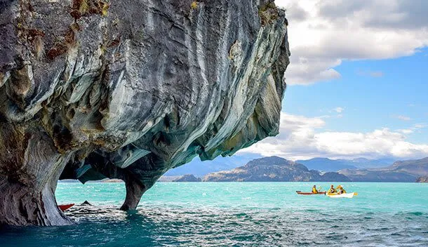 kayaking towards the caves