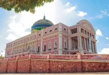 Opera house glowing on a sunny day in Manaus