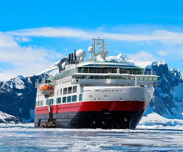 Large Antarctica Cruise tour sailing through icy waters