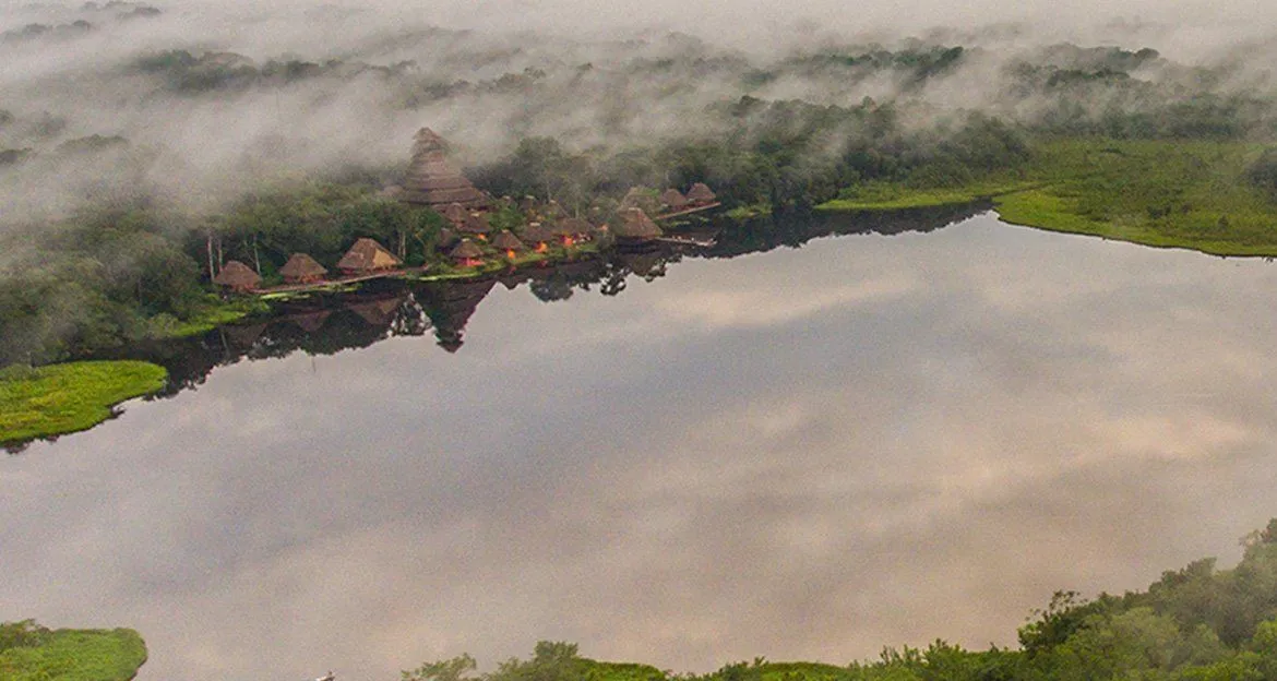 aerial-view-of-remote-jungle-lodge-and-lake