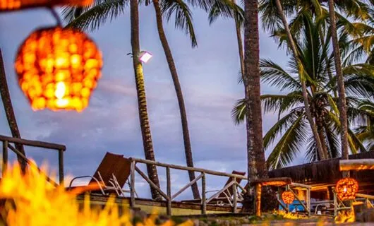 Dusk lit Kiaroa Eco-Luxury Resort outdoor area