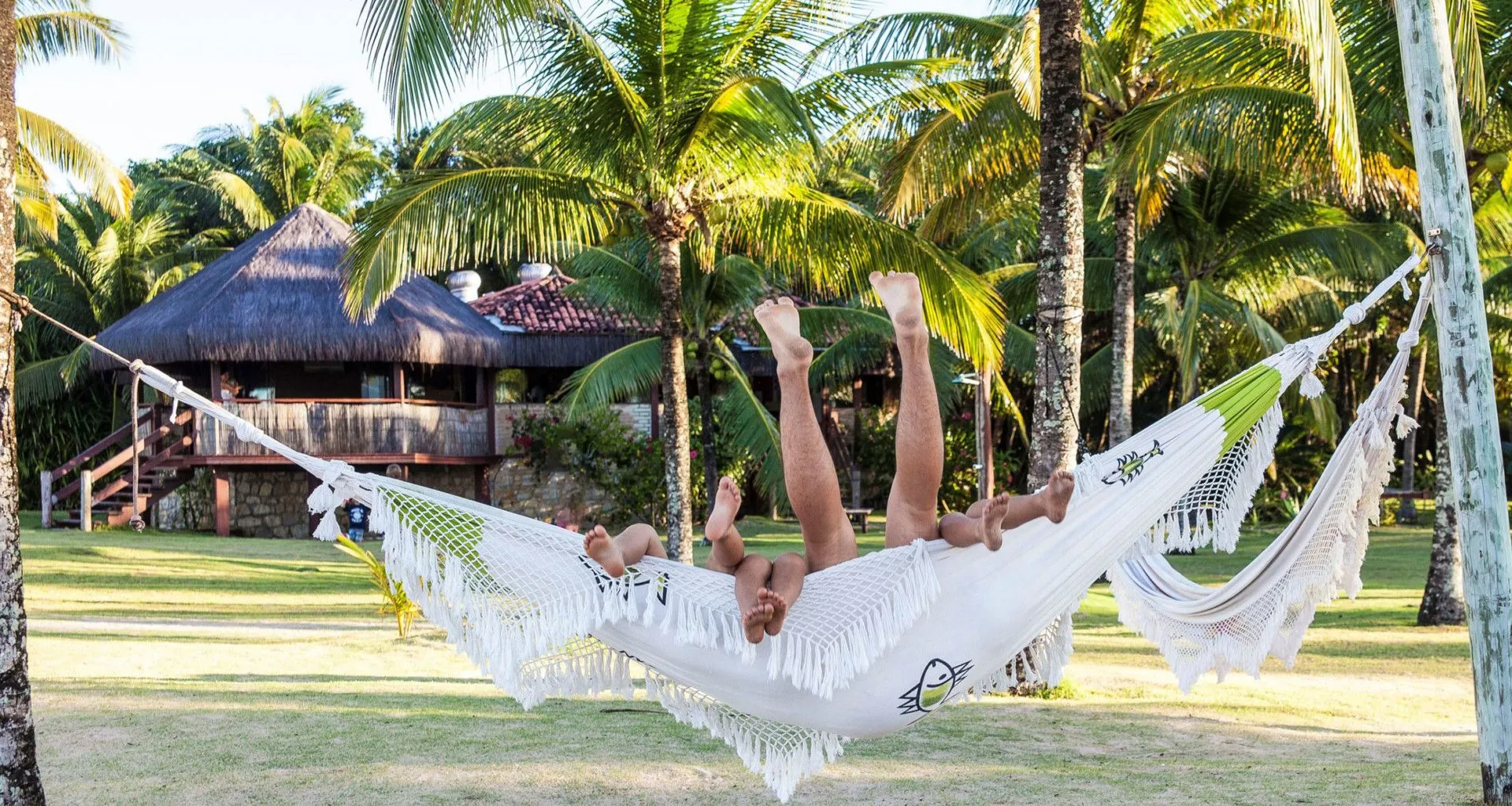 Guests laying on hammock
