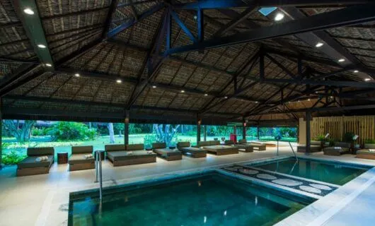 modern pool lounging area in Tivoli Eco-Resort Praia do Forte