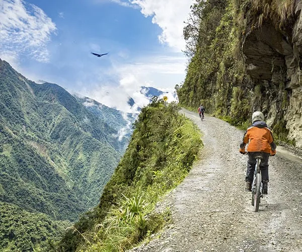 bikers-on-dramatic-mountain-road-in-bolivia