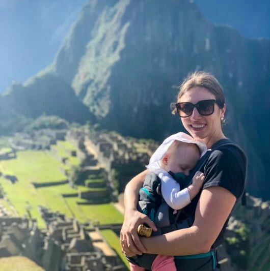 Mom and daughter at Machu Picchu on a sunny day