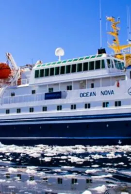Cruise ship among ice floes in Antarctica