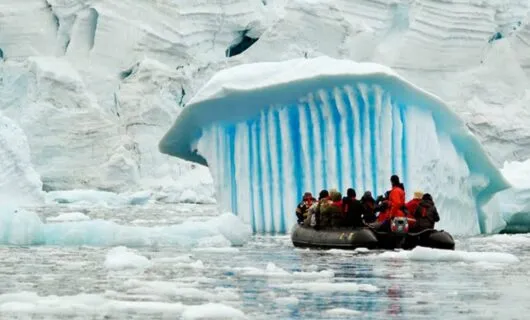 Antarctica group on polar raft near ice cap