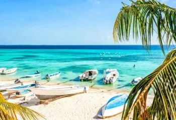 Boats moored on beach in Venezuela