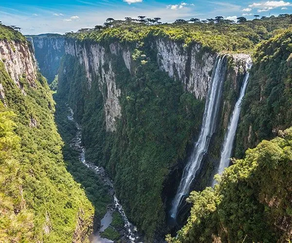 Stunning waterfall and mountain landscape on south america nature tour
