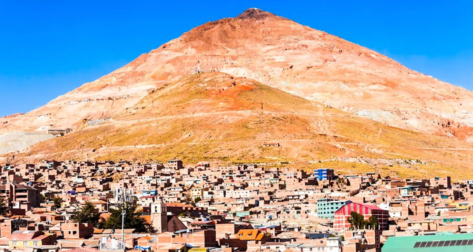 Mountain peak rises behind Bolivia town