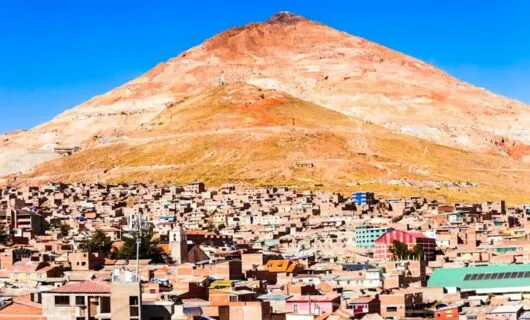 Mountain peak rises behind Bolivia town