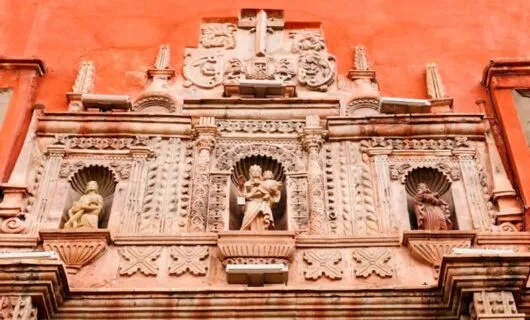 Statues on wall of Bolivia museum