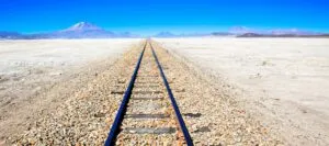 Train track across salt flats of Bolivia