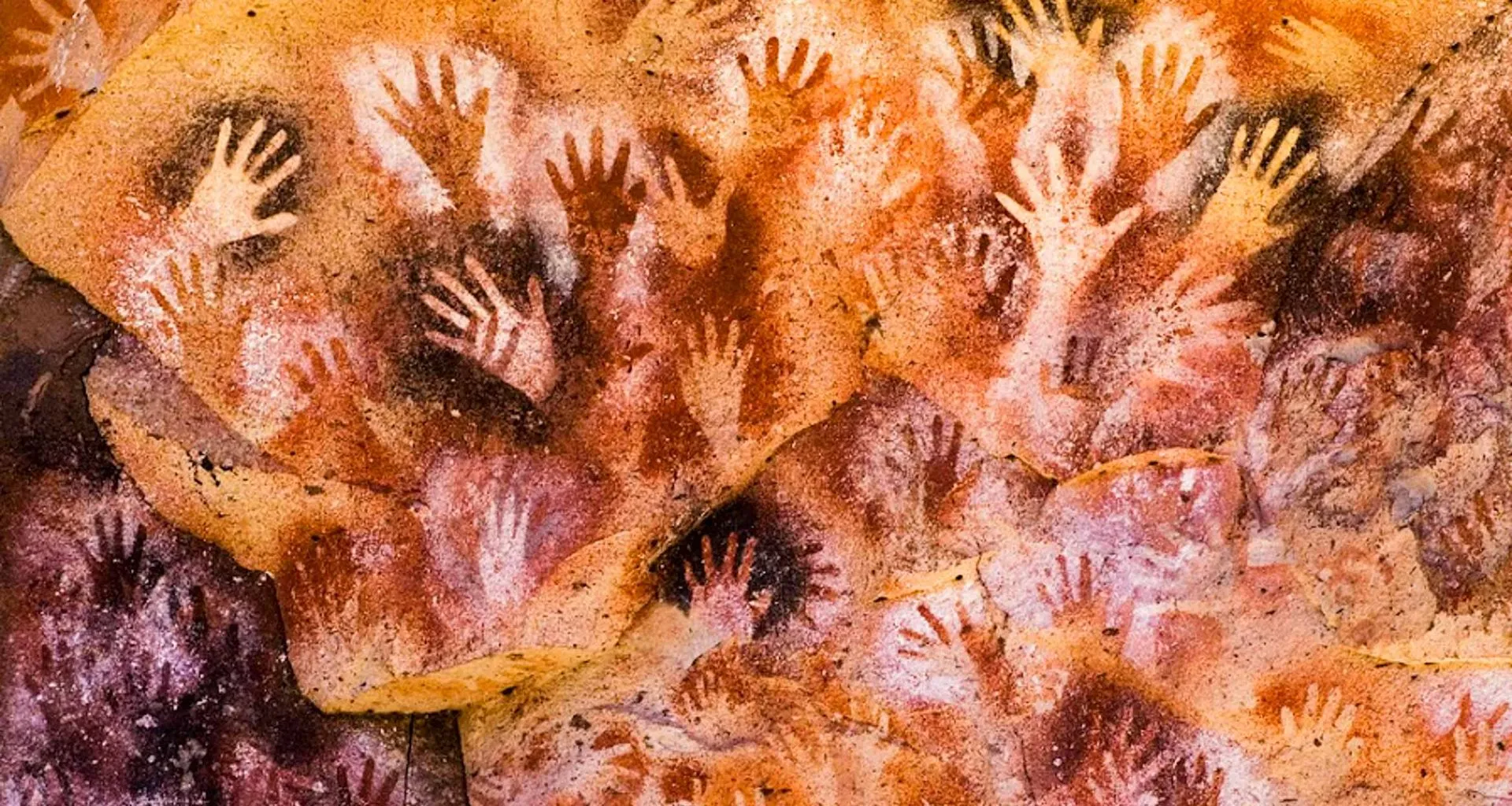 Handprints on cave wall in Cave of the Hands