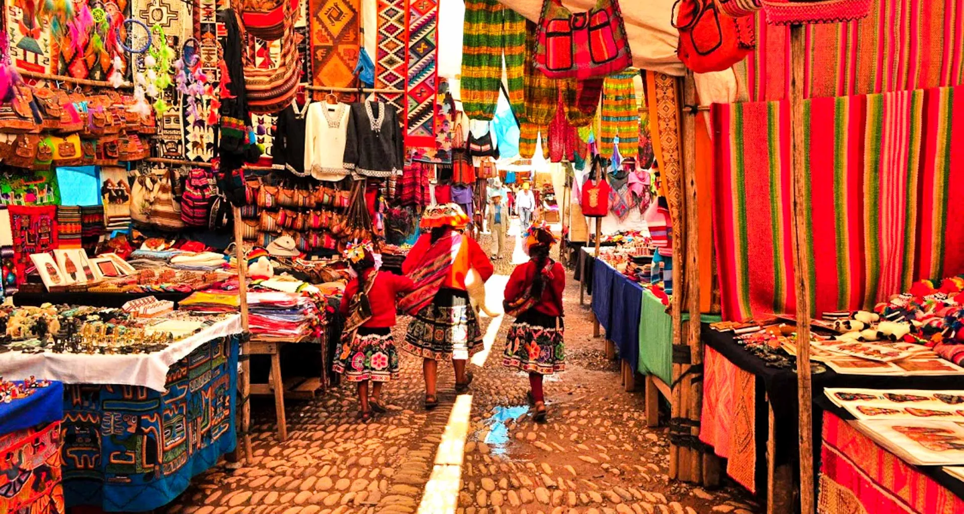 Woman walks through cloth market