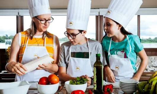 People take cooking class on cruise ship