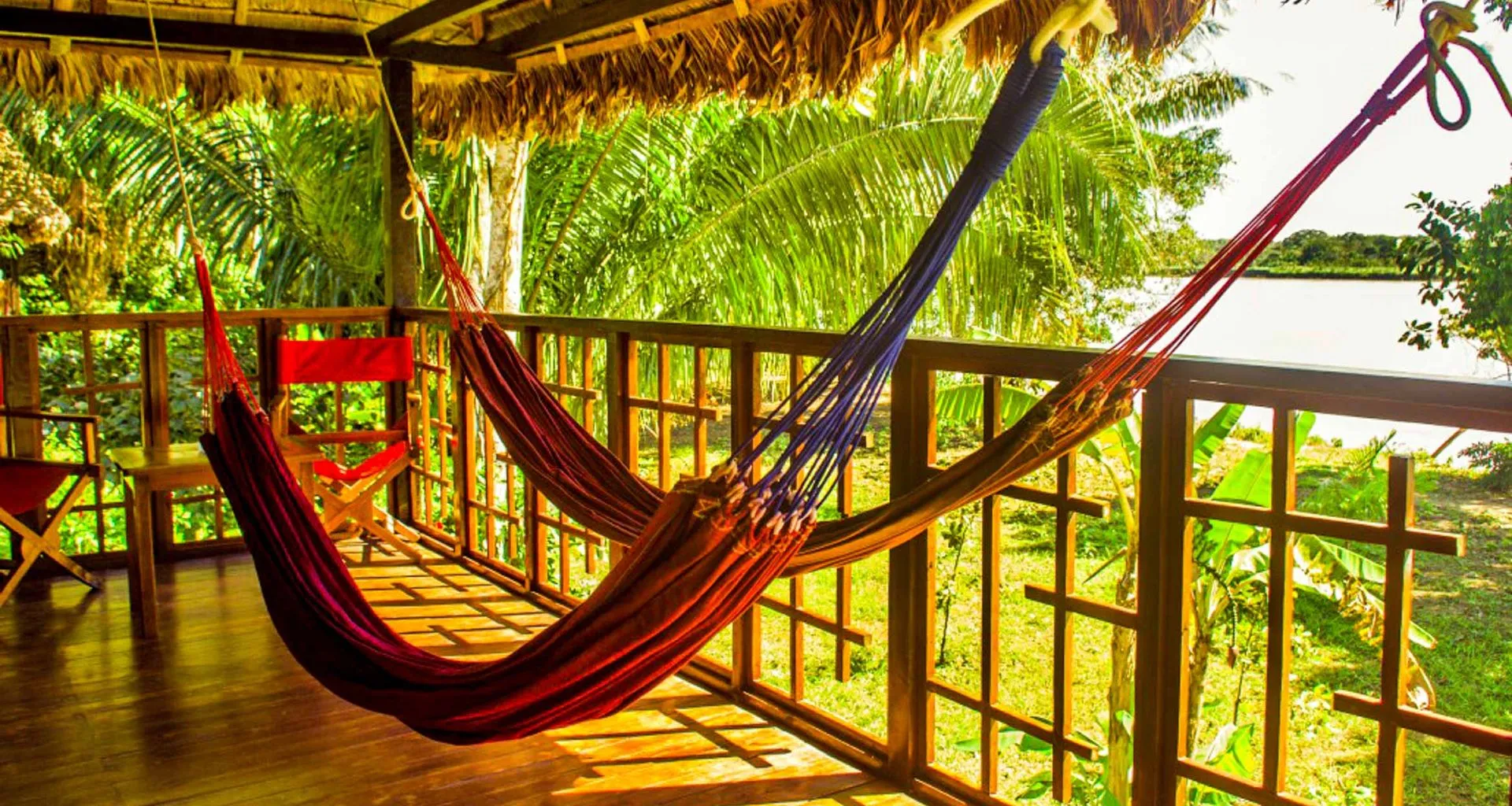 Two hammocks hang on deck of Corto Maltes Lodge