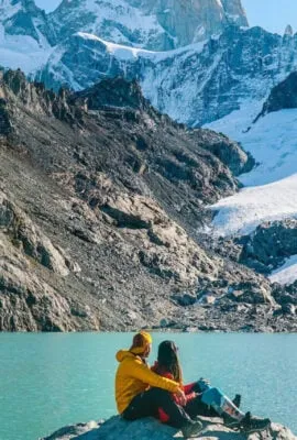 couple in patagonia staring at mountains