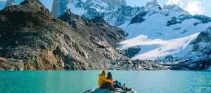 couple in patagonia staring at mountains