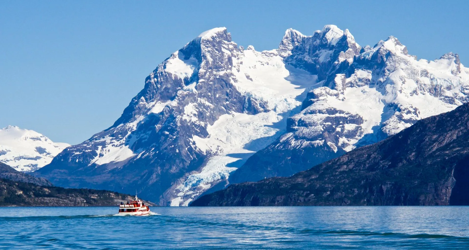 Cruise ship in front of Chile mountains