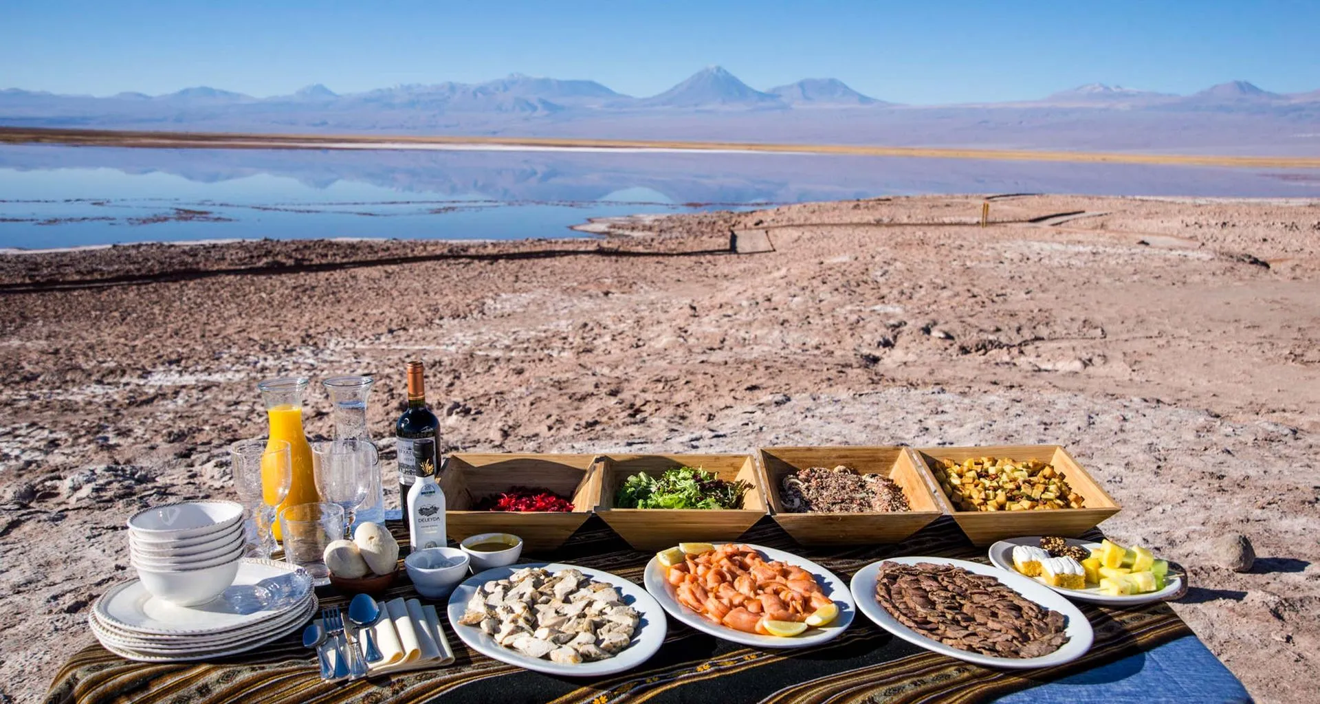 Picnic laid out in desert near mountains