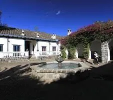 fountain and exterior of the hacienda