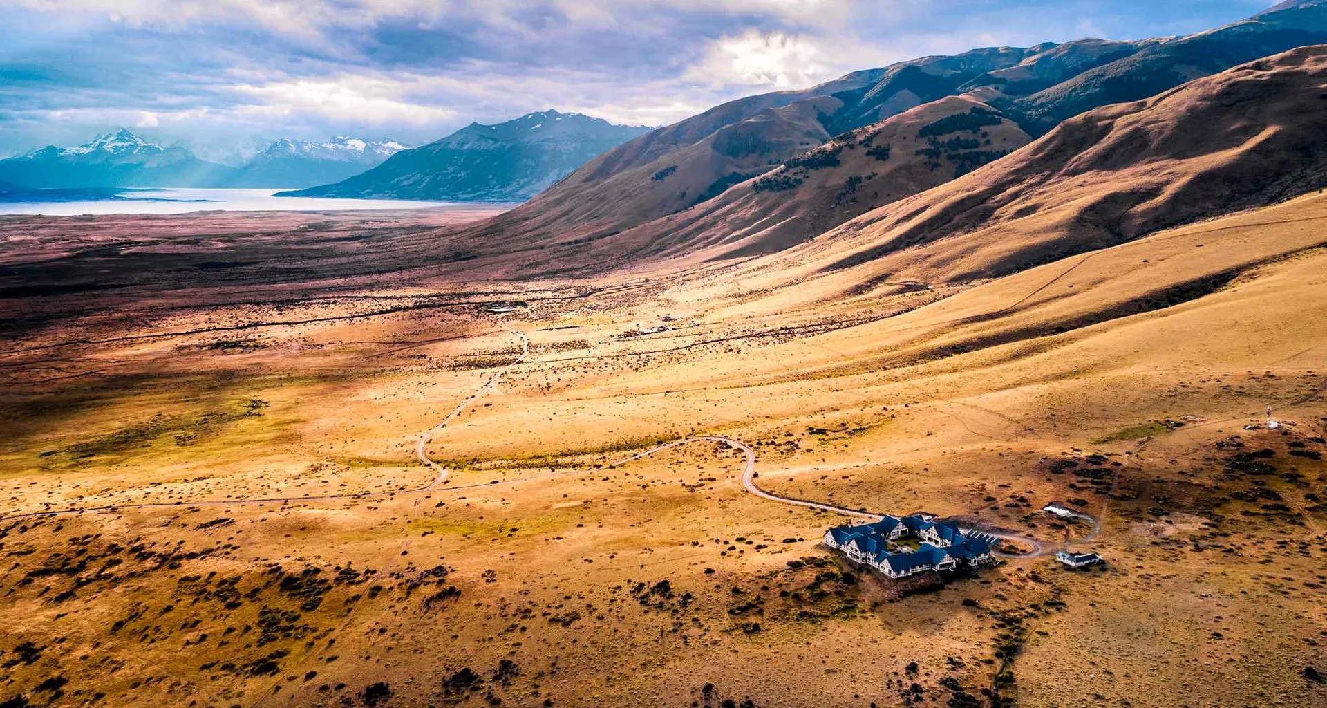 Aerial view of Eolo Lodge and surrounding valley