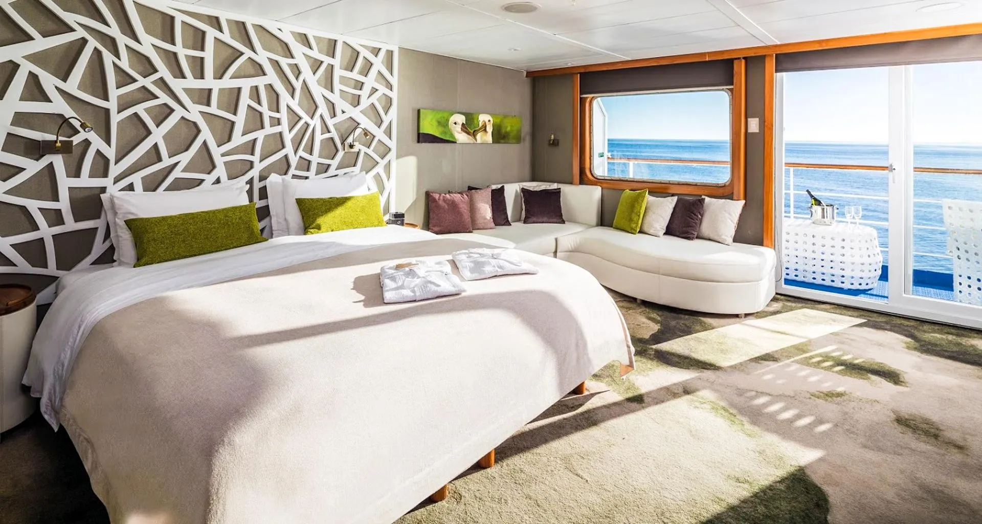 Bedroom in suite of Galapagos cruise ship