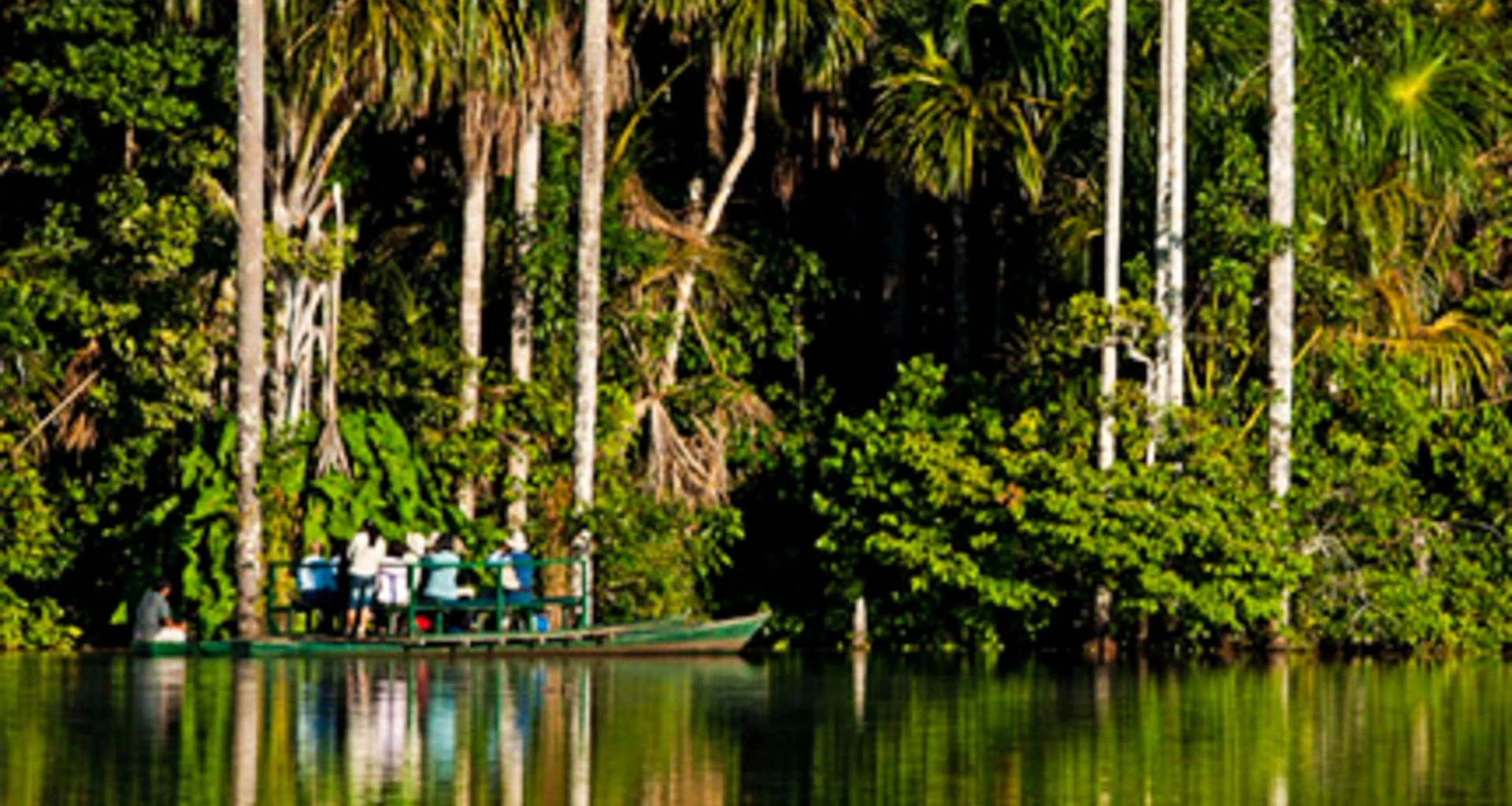 Group of travelers takes canoe down river
